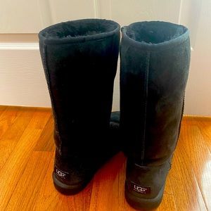Black tall UGGS. They have been loved but are in great condition!